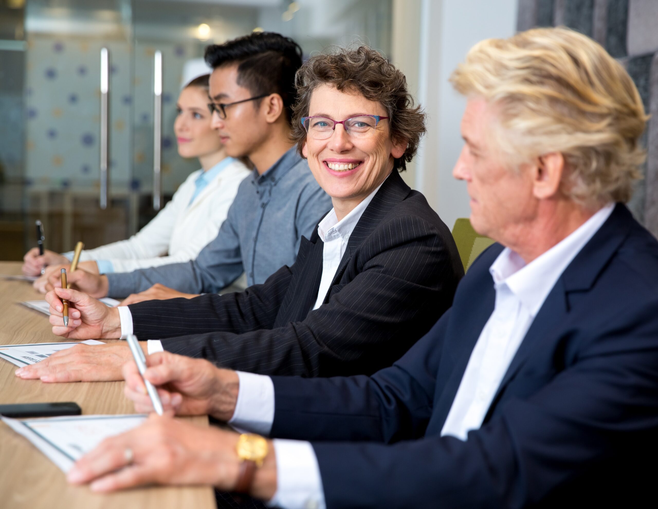 Senior people in a meeting